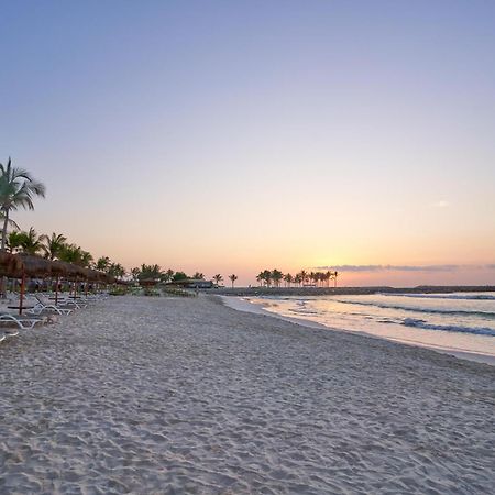 Salalah Rotana Resort Εξωτερικό φωτογραφία Sunset at the beach